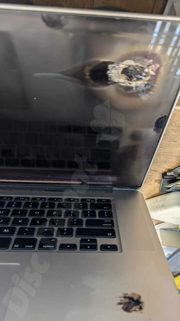 MacBook with lithium battery burning damage at Disc Depot Dundee