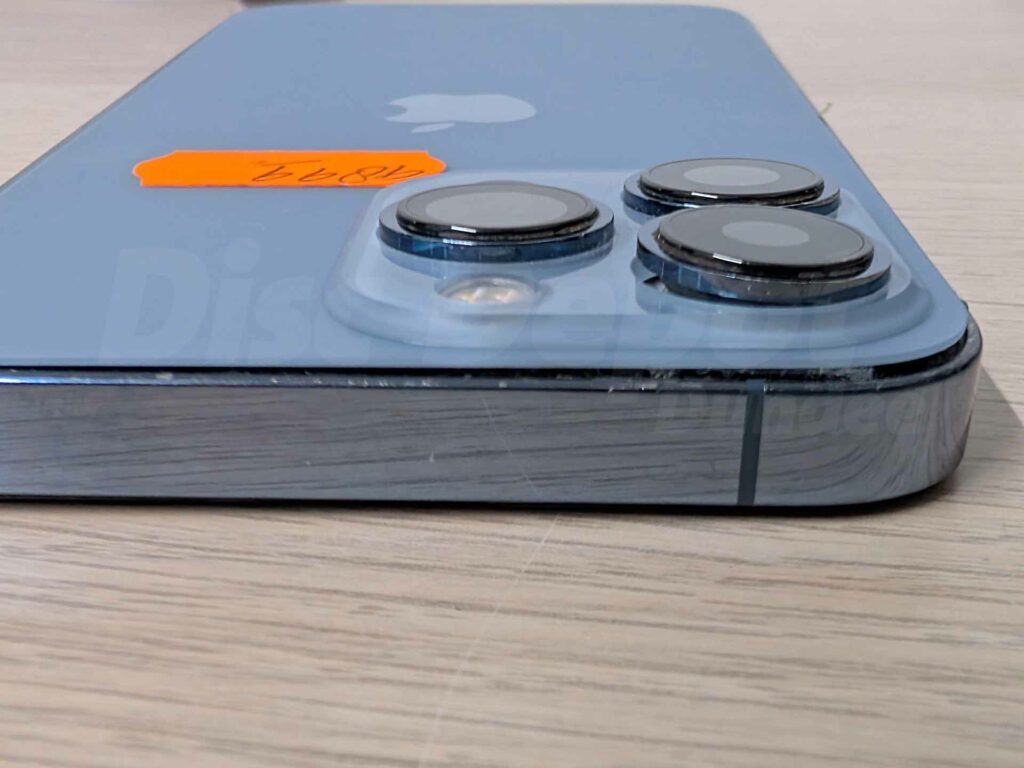 iPhone 13 Pro showing faulty back glass replacement from two angles